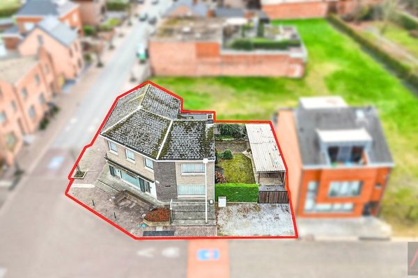 Handelspand met woonst
                            te koop in Heusden-Zolder